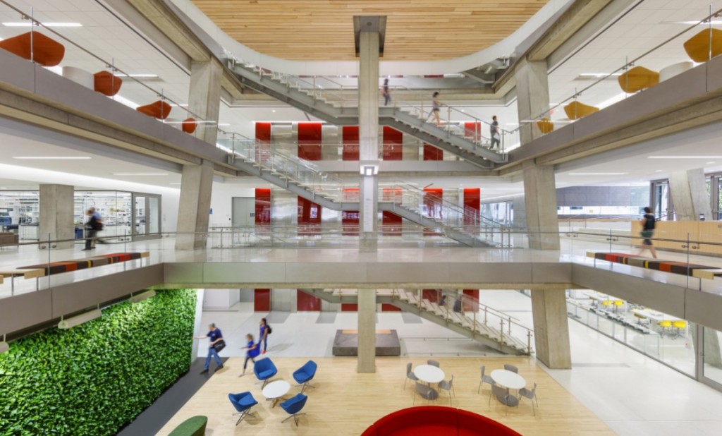 The SEH interior features a green wall and open spaces. (Photo: Ballinger)