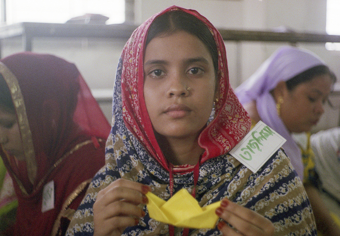 A garment factory worker participating in team building exercises at the Intramex Group Factory.