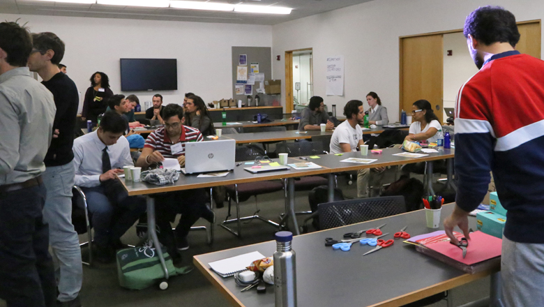 Teams work to create the first prototype of their solution.