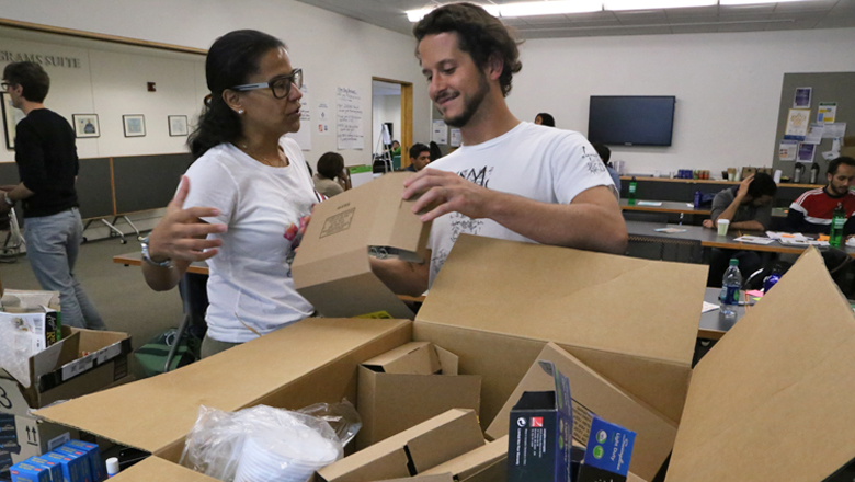 Team members use recycled items to create their prototypes.