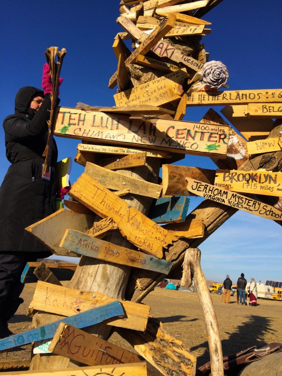 In Solidarity We Stand: A makeshift sculpture stands at the edge of the grounds near the river. It sits along the riverbank as a solemn reminder of the reason we, and so many, travel here.