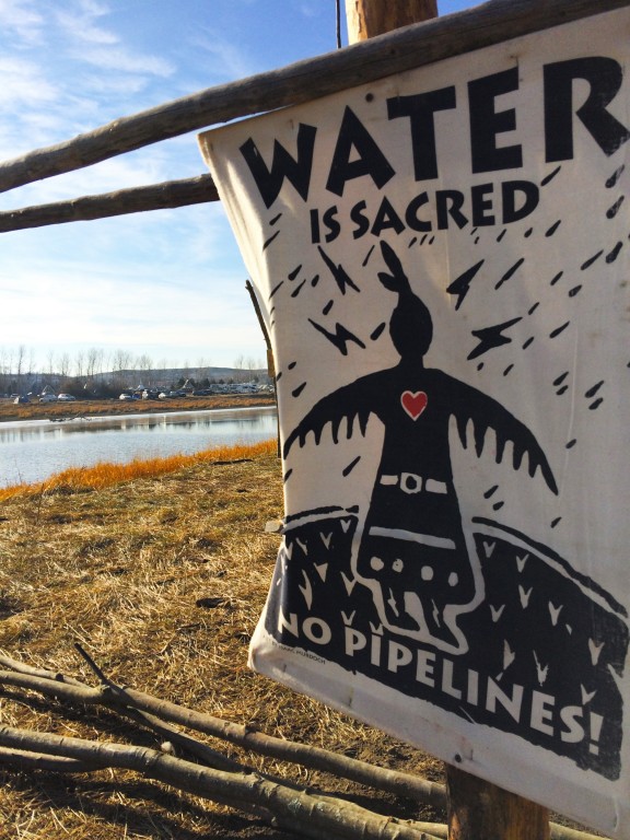 Print of Action: The Keystone Pipeline threatens the water that runs through the Sioux burial grounds. It threatens the sanctity of the Sioux ancestors resting in peace below the surface. This print is earned while at the camp; a symbol of pride for those who attain one.