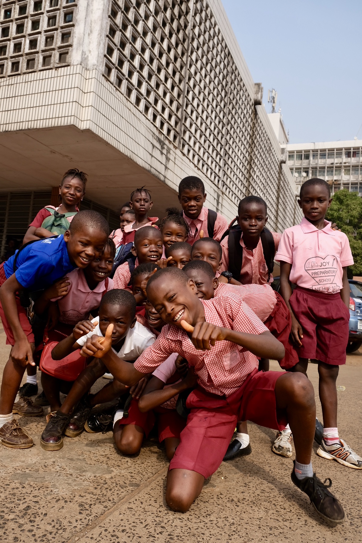 Children from a school that has implemented the TKEEP curriculum smiling before participating in a march for climate change. (Cate Twining-Ward/George Washington University)