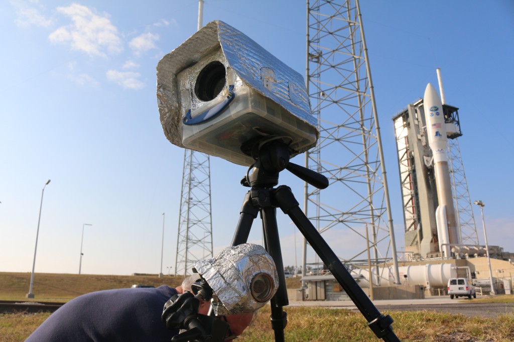 Photographers and journalists set up remote devices to activate the shutter, either by timer or sound, when the launch begins. (Kelly Calagna/MEDILL)