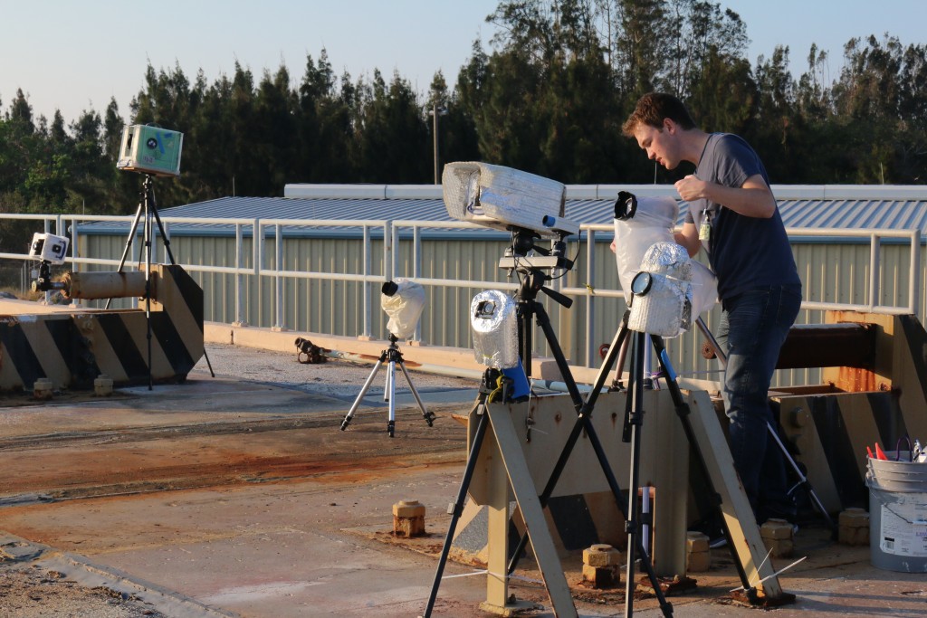 Some cameras are set up with plastic bags in an effort to keep moisture out of the lens. Whether it is rain, morning dew or Florida humidity, any wetness within the lens could be problematic. (Kelly Calagna/MEDILL)