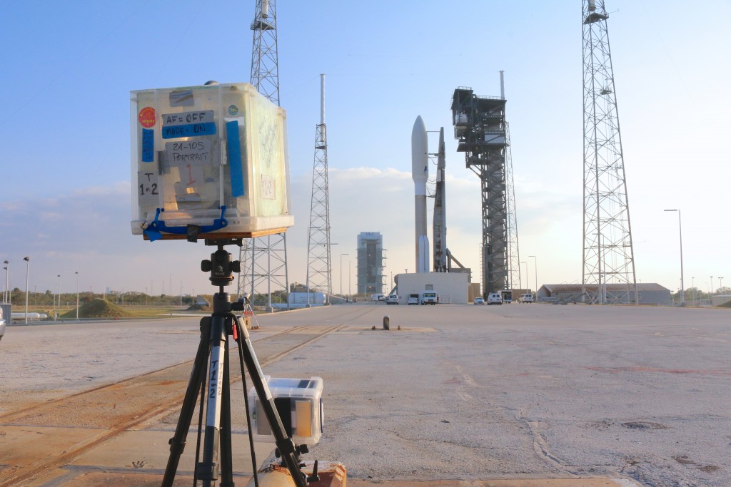 To prevent cameras from blowing away in the blast, they are either staked into the ground, or taped or cable tied to fixed objects; such as these attached to a metal figure near the pad. (Kelly Calagna/MEDILL)