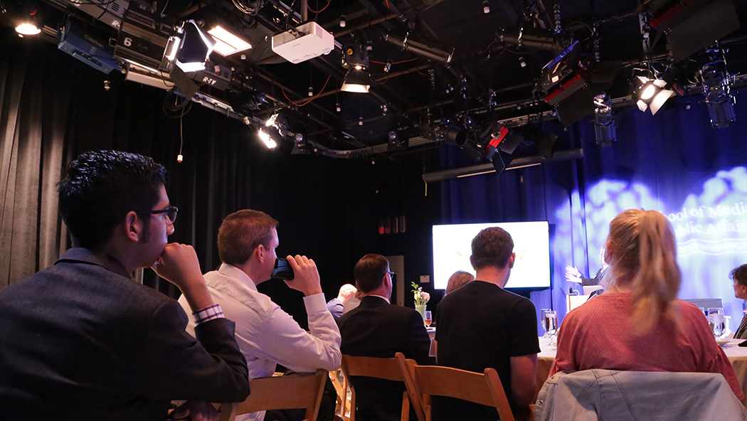 The crowd actively participates in the discussion!