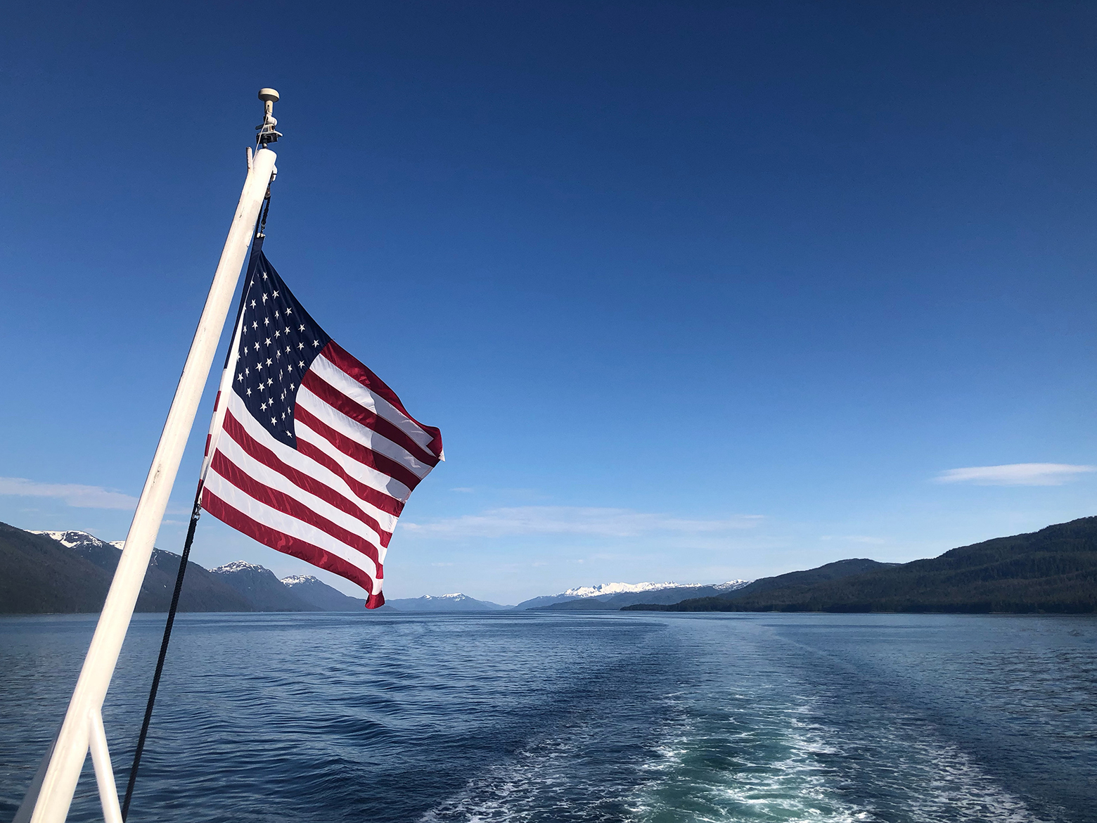 The Sea Lion sails away from Glacier Bay National Park.