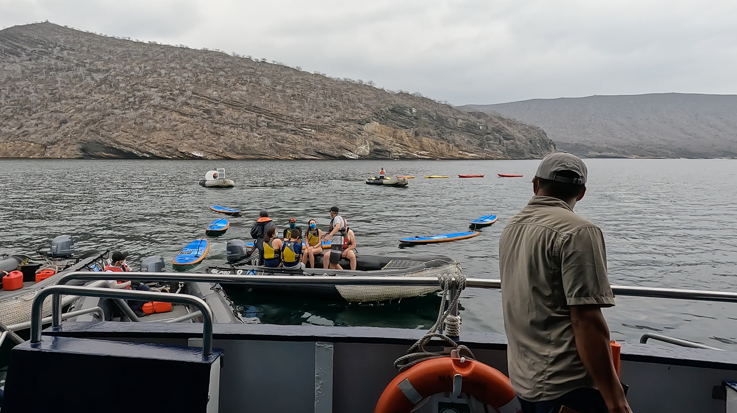 Our expedition leader, Juan Carlos Avila, supervises the process of getting guests onto paddleboards and kayaks.