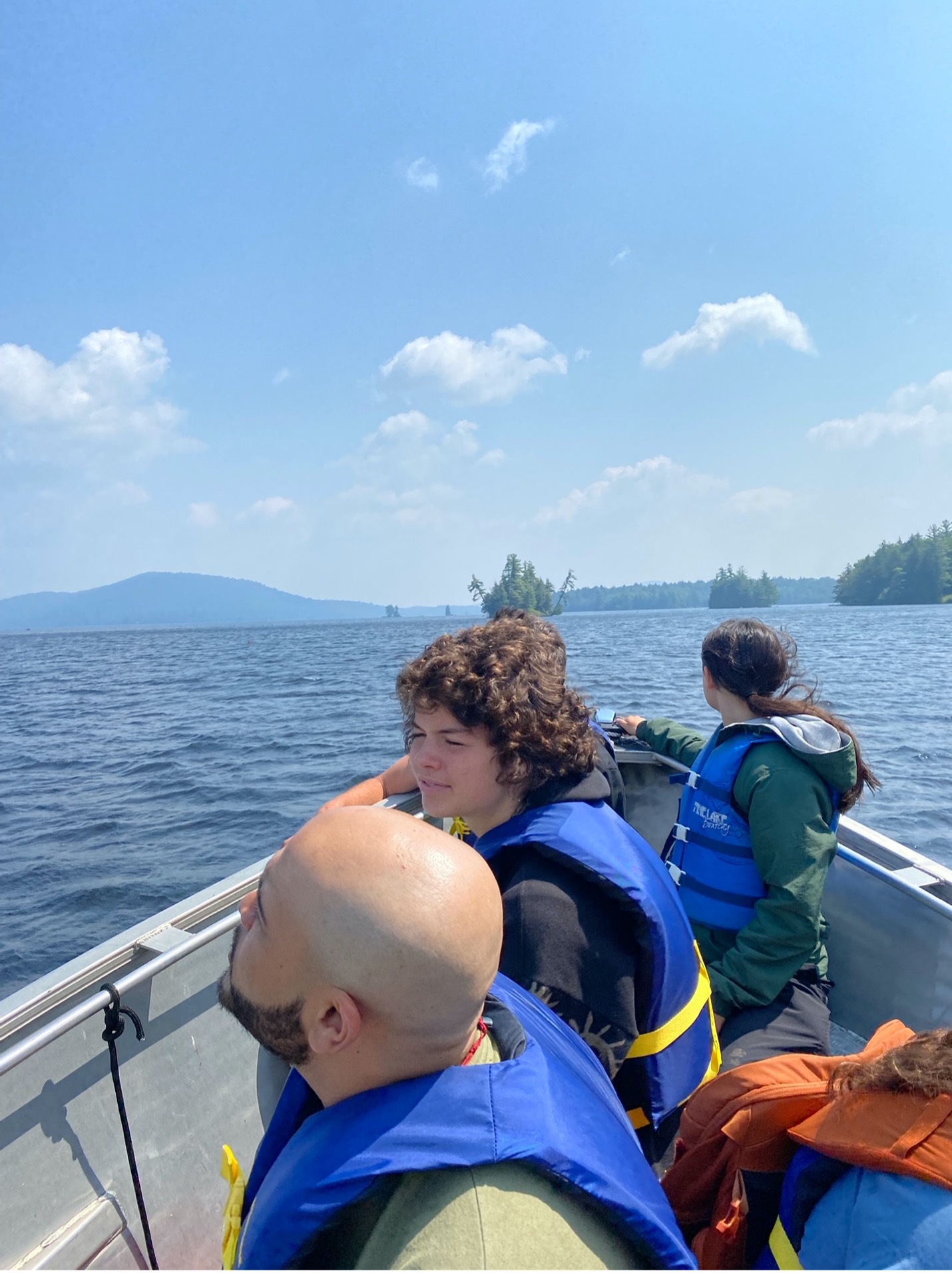Students learning aquatic sampling techniques on Cranberry Lake.