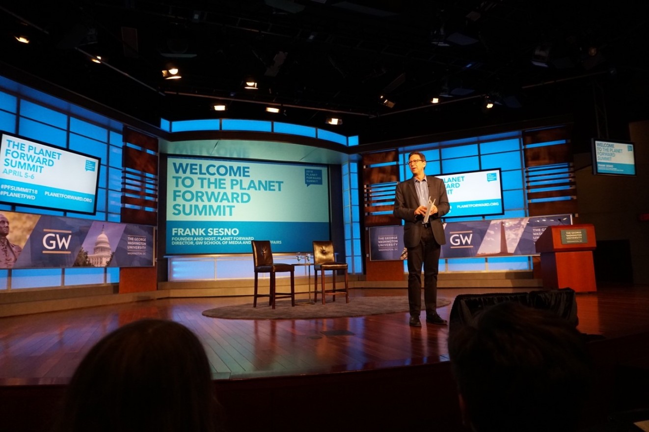 Planet Forward founder Frank Sesno speaks on stage. (Kenzie Schmitt)