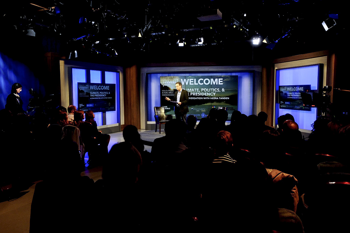 Frank Sesno, Planet Forward founder and School of Media &amp;amp; Public Affairs director, welcomes the audience to A Conversation with Neera Tanden: Climate, Politics, &amp;amp; the Presidency. (Dan Reed/Planet Forward)