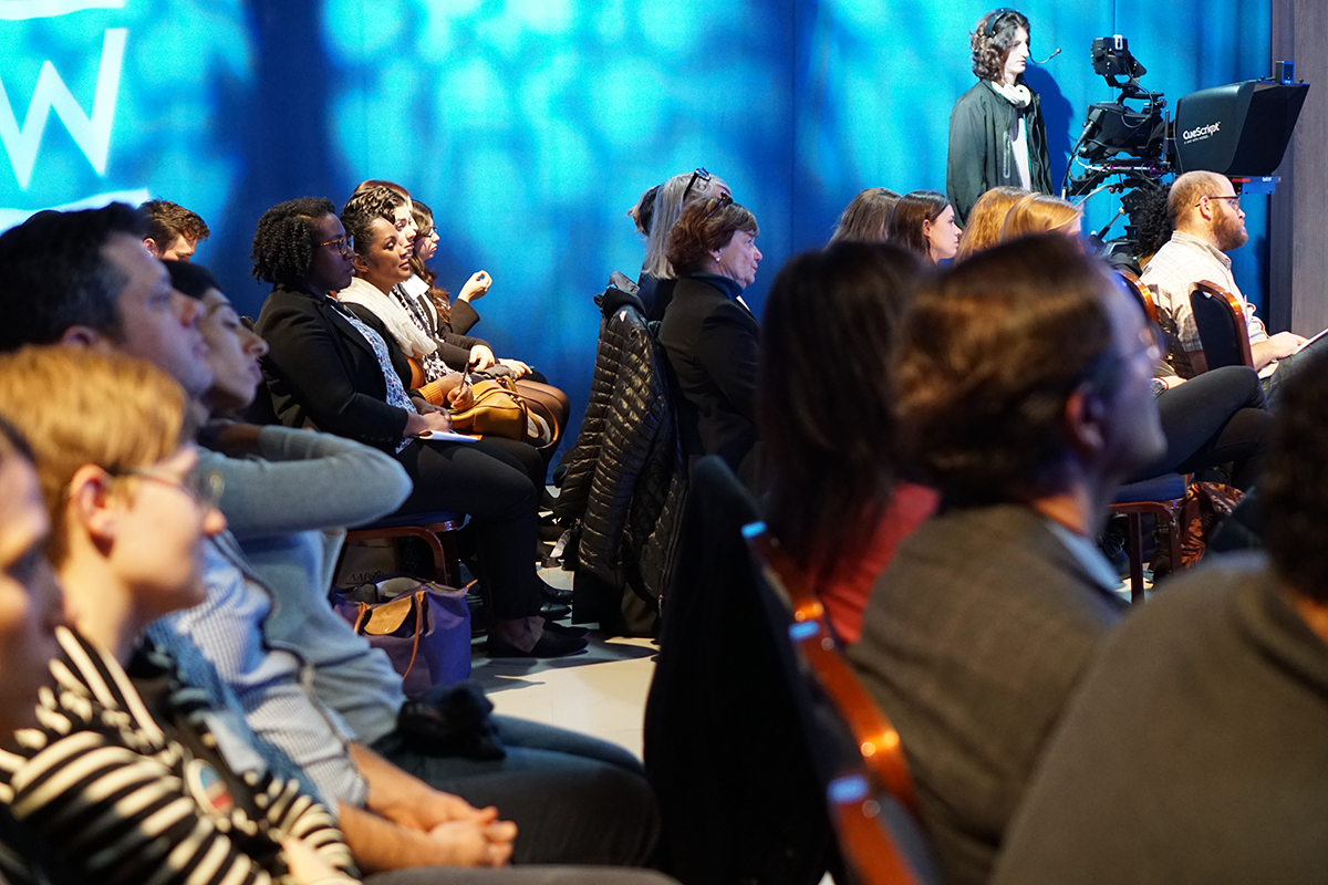 The audience listens intently during the discussion of environmental justice and marginalized communities. Tanden said: &quot;Environmental justice is the right thing to do. Regardless of race or income, environmental justice is an important issue to address.” (Kim Ossi/Planet Forward)