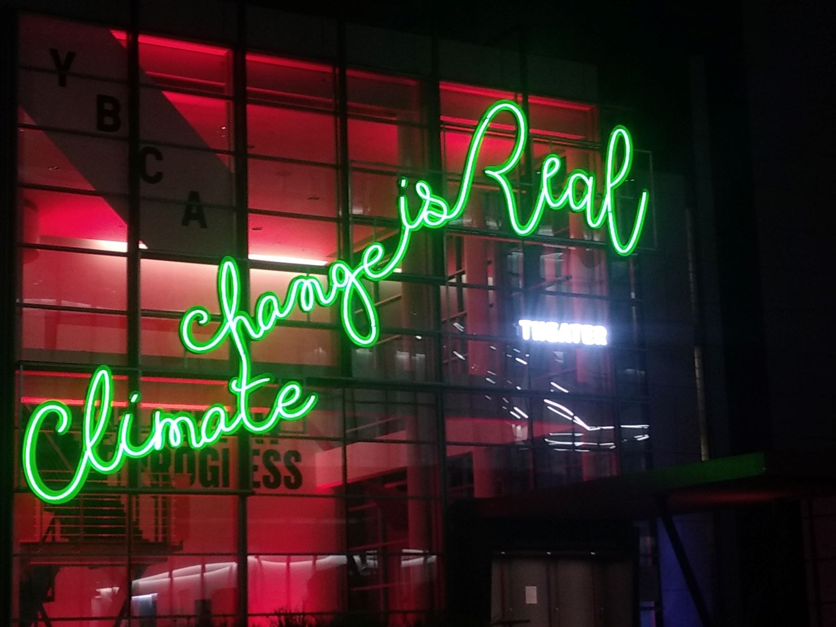 A sign on the side of the Yerba Buena Center for the Arts theater, across from summit headquarters in the Moscone Center, offers an important message for attendees of the “Global Climate Action Summit.” (Aaron Dorman/Medill)