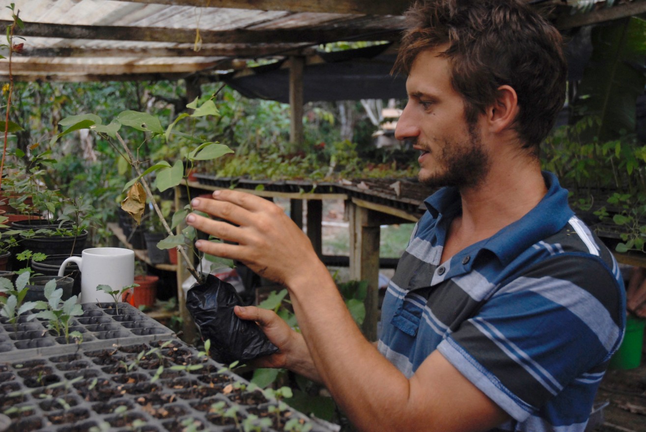 Kalu Yala’s agricultural director Jon Trimarco enthusiastically displays the various plants he and his team of interns are growing in the farm.