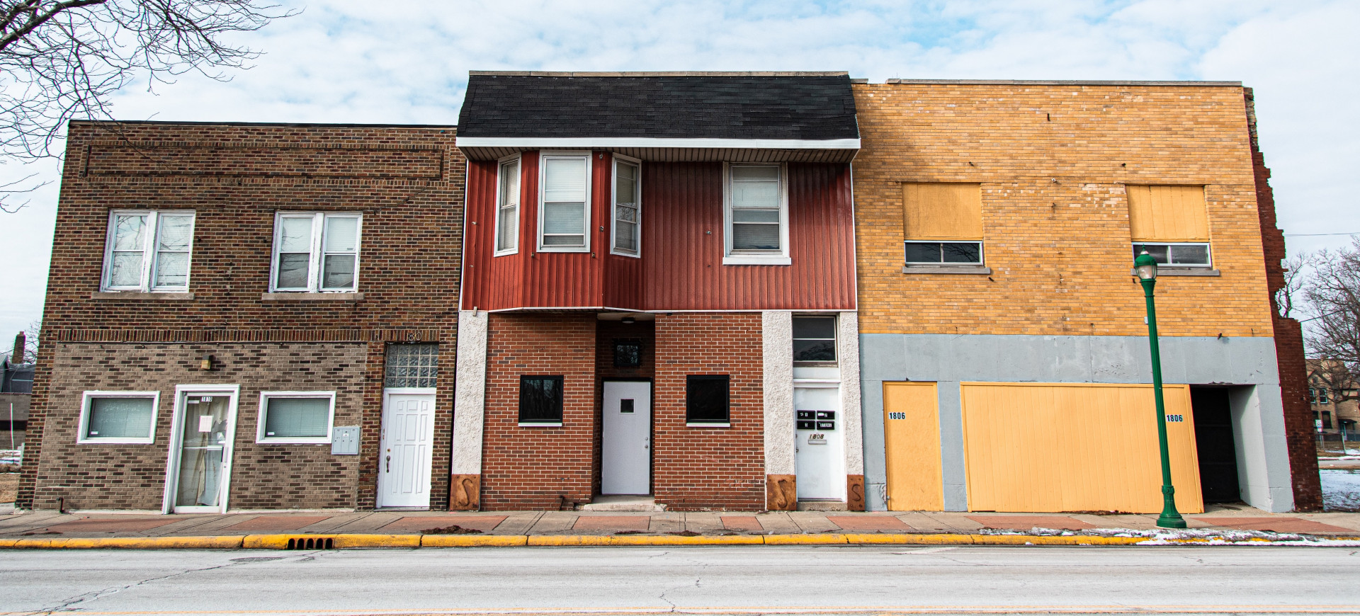A row of abandoned storefronts in North Chicago, Illinois. 