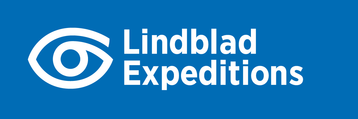 Logo for Lindblad Expeditions - white eye on blue background with text "Lindblad Expeditions"