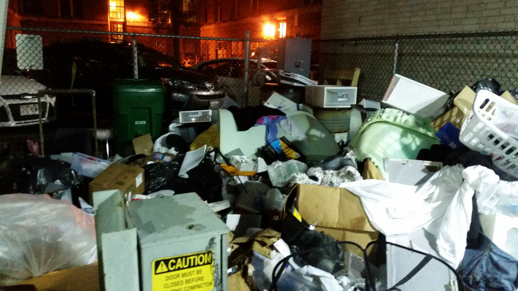 Trash from dorm move-out piled up
