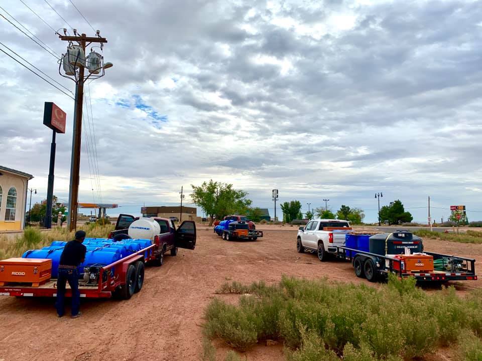 Volunteers with Water Warriors United set out to deliver water across the Navajo Nation.The organization has four 16-foot flatbed trucks that carry 550-gallon tanks, hoses, equipment and a water pump. (Photo courtesy of Water Warriors United)