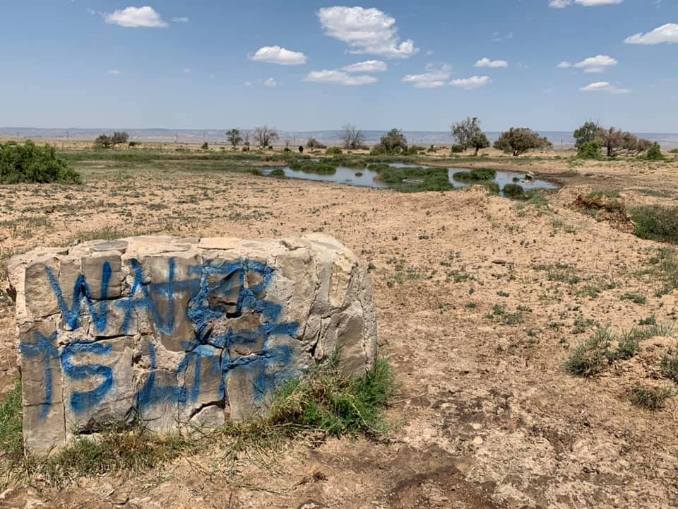 The Navajo people say that water is life, but plentiful, clean water is hard to come by on the reservation. Many households are not good candidates for centralized water systems because extending water lines is expensive. (Photo courtesy of Water Warriors United)